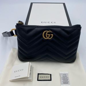 Women’s Gucci GG Marmont quilted Leather wrist pouch made in Italy